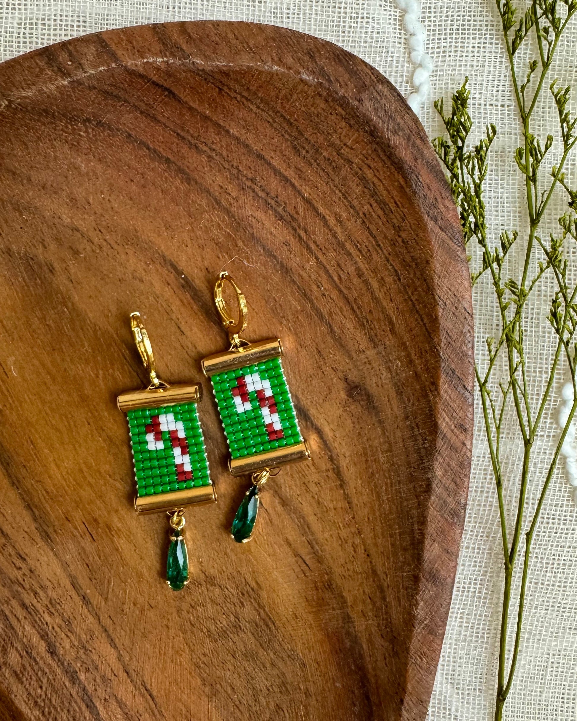 Candy Cane Earrings on Wooden Tray
