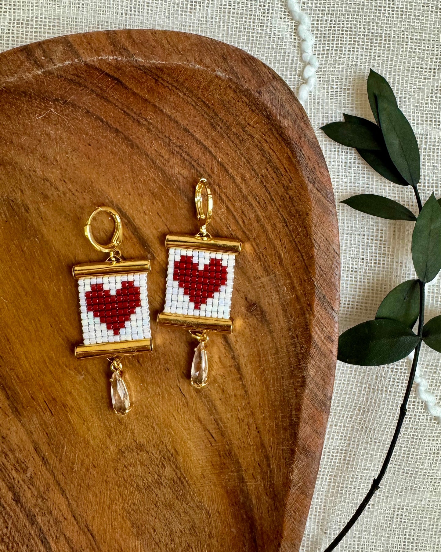 Red Heart Earrings on Wooden Tray