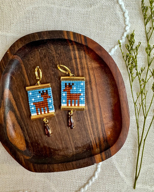 Rudolph Earrings on Wooden Coaster