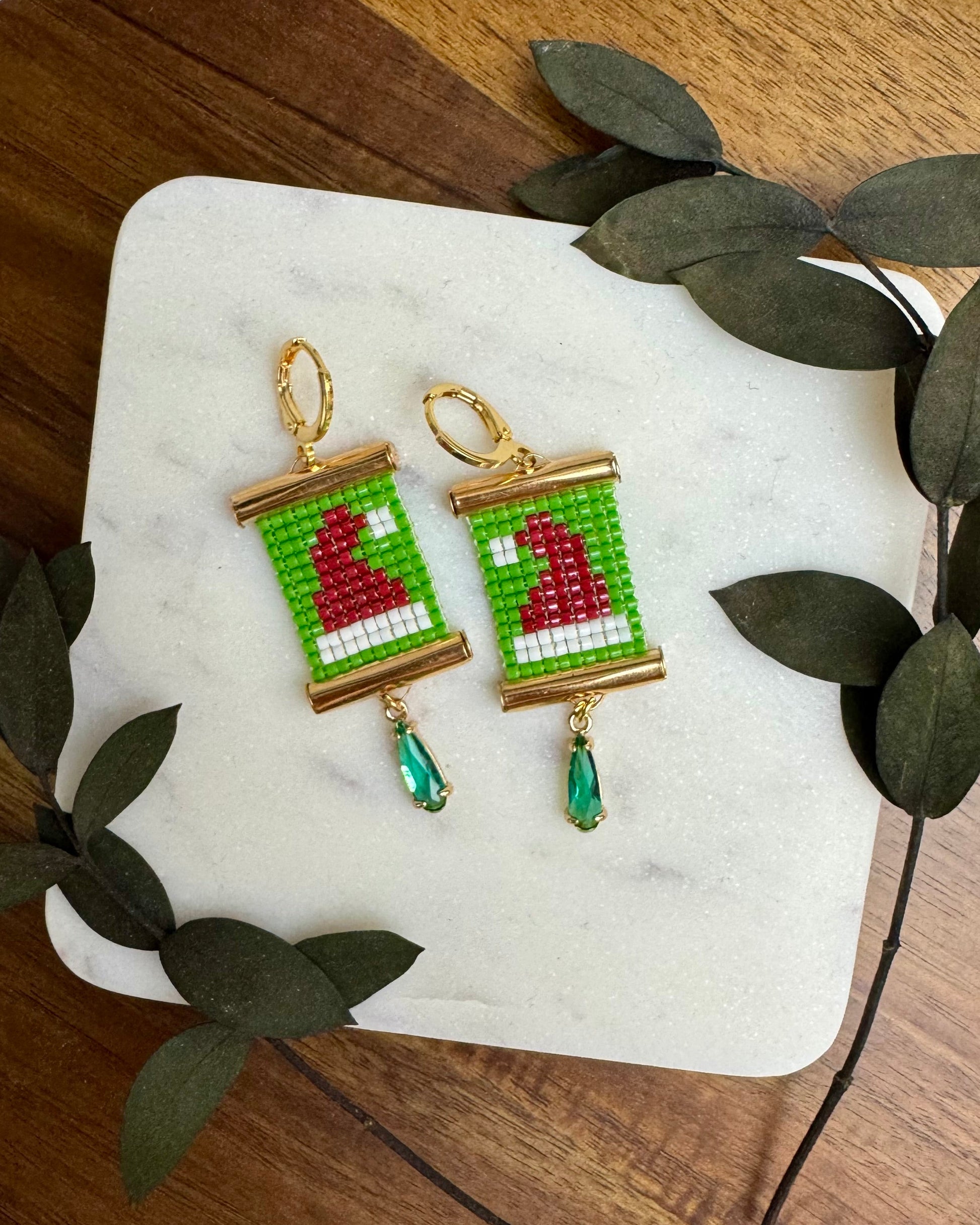 Santa Hat Earrings on White Marble