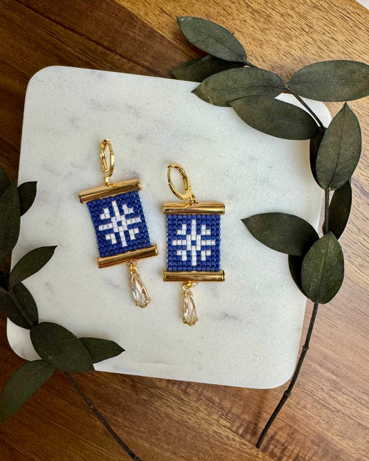 Snowflake Earrings on White Marble