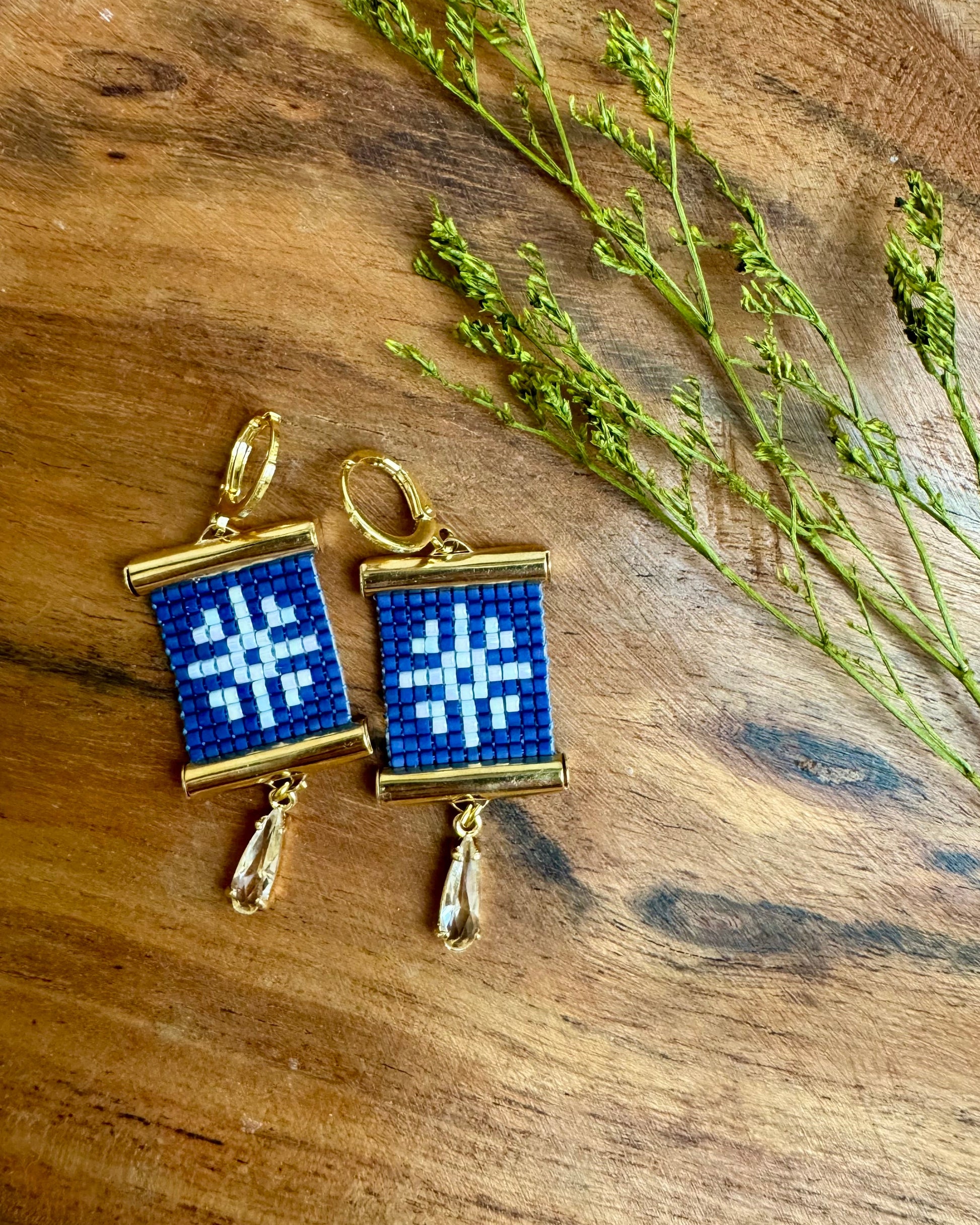 Snowflake Earrings on Wooden Tray